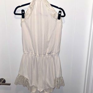 White romper with lace detailing